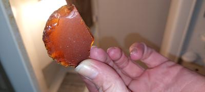 Wondering how to date this amber sea glass